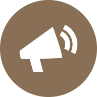 White megaphone on brown background