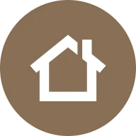 White house silhouette inside brown circle